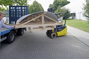  Unloading the shells from the low-bed trailer with the aid of a fork-lift 