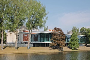  The glazed pavilion interrupts an existing row of trees on the banks of the Meuse 