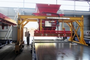  Due to the restricted available space, a rail-based, bridge-like concrete spreader that is fed via a rotary bucket conveyor was selected 