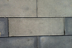  → 2 Concrete slabs colored in black shade; a part of the slabs is visibly lightened 