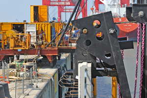  The first concrete wall for the rehabilitation of the quay is positioned with a special-purpose pontoon  