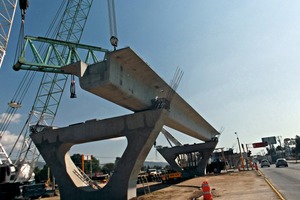  Mounting a 42.1 m long TA-type beam weighing 172.5 t; the maneuver is performed using two cranes with a capacity of 140 t on one end and with a capacity of 180 t on the other  