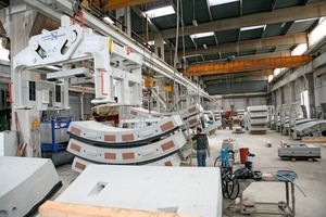  Fig. 1 Manufacture of the tunnel lining segments is in full swing at the new, high-capacity production line. 