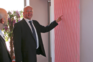  Reckli sales director, Alexander Turpakov (right), presents the pink concrete panels in the interiors 