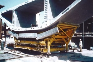  Fig. 2 Completed precast field segment on soffit form moved by transfer cart into parking position. 