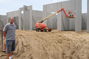  Fig. 4 Derek Finocchiaro on a construction site with precast concrete elements from MPC. 
