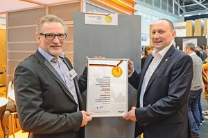  Bernhard Kölsch, Managing Director of Betondesign-factory (left), and Roy ­Thyroff, Managing Director of V. Fraas Solutions in Textile, at the ceremony during presentation of the Federal Award for Outstanding Innovations for Crafts and Trades 