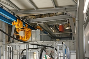  The concrete is delivered by the bucket conveyor below the mixer systems 