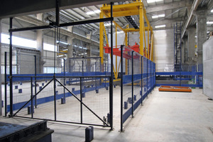  9The curing chamber consists of three rack towers, each with 14 pallet bays one above another 