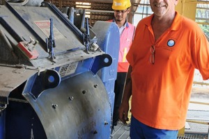  French expert Richard Hunt (front) presents the BHS mixing plant for the concrete production ... 