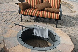  The company’s sample yard gives interested visitors an overview of the products of Phoenix Paver, for ­example, this round fire pit with built-in barbeque 