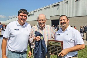  Jim Park, past Chairman of the Board (middle), was presented with a special tennis tournament that will be held annually  