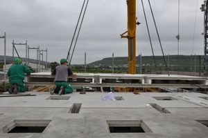  Sandwich cross-section of the Ceiltec B floor slab consisting of two ribbed slabs and a void. The two layers effectively connected are reduced to the absolute minimum saving a lot of mass and weight. The void provides much space for the TBE ducts 