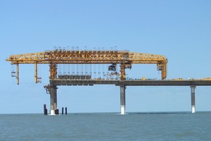  Fig. 5 All segments for a span are suspended from overhead gantry before they are glued and stressed together.  