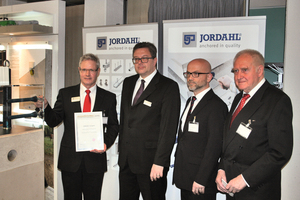  Michael Pantelmann (Sales Director at International Jordahl GmbH) accepts the Innovation Price for the Supplier Industry for Concrete Products 2015 from Dr. Ulrich Lotz (Managing Director FBF Betondienst), Christian Jahn (­Editor-in-Chief of BFT International) and Prof. Dr.-Ing. Wolf Reinhard (Stuttgart University, from left to right) 