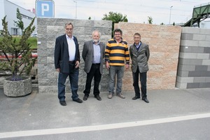  General Manager, Michel Cornaz (2nd left), together with his team welcome ­Alexander Eysink in front of one of the ­example walls 