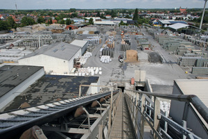  The conveyor moves the aggregates from the bin to the mixer tower  