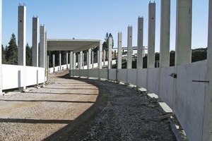  Semi-precast elements are inserted between the columns and filled with cast-in-place concrete.  