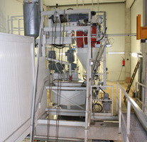  Fig. 9 The mixer is fed with raw materials by a skip elevator with safety device.  