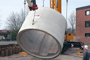  Following the transportation to site, heavy-duty vehicles were used in ­order to get the giant reinforced concrete pipes back into the horizontal laying position with the aid of a special anchoring  