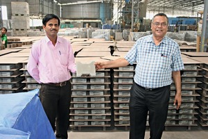  CEO Sudhakar Mody (right) and one of his employees proudly present concrete products made by ­Super Tiles &amp; Marbles 