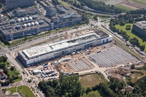  → 1 Aerial photograph of the Möbel Höffner site in Neuss during the construction phase 