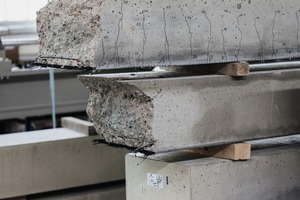  → Textile-reinforced structural concrete slab after testing (tensile failure of textile) [3] 