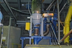  A motor-powered suction system was installed to prevent dust from being emitted from the mixers 