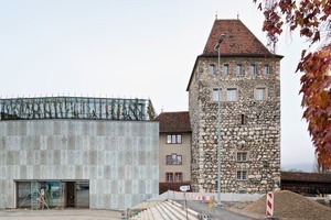  The concrete façade depicts 134 different human silhouettes 