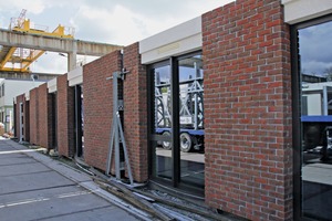  High-quality sandwich façade elements on the factory site of Hurks in Veldhoven ready for shipment to the construction site in London, England  